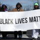 Members of Black Lives Matter DMV participate in the annual Martin Luther King Holiday Peace Walk and Parade January 18, 2016 in Washington, DC.